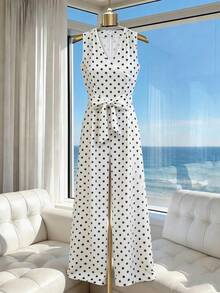 GlowEve Bộ jumpsuit chấm bi cổ chữ V chéo, không tay, có thắt lưng, kiểu dáng thanh lịch, thoải mái cho mùa xuân/hè, thích hợp cho nữ, thích hợp đi nghỉ mát, đi biển hoặc dự tiệc. - Đen và trắng - Xem 4