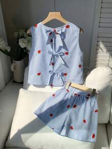 SHEIN Conjunto informal de 2 piezas de niña preadolescente para vacaciones, con parte superior de tirantes con volantes y lazo en la espalda, y shorts, con bordado de fresa y rayas azules y blancas - Azul - Ver 2