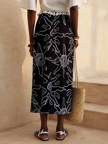 Lyxana Contrast Color Vacation Floral Print Waist Splice Tassel A-Line Skirt For Women - Black and White - View 3