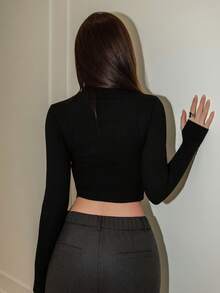 Bris Aura 2025 New Arrival Minimalist Fall-Winter Women's Slim-Fit Turtleneck Cropped Long Sleeve Top With Bold Metallic Eyelet Hem, Avant-Garde, Urban Cool Style, Statement Piece, Figure-Flattering, Party-Ready Eye-Catcher, Hot Girl, Cutting-Edge Design, Fashion-Forward, Black Top - Black - View 2