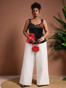 Truni 大码女士性感印花撞色蕾丝吊带背心，适合通勤、派对和约会。黑色上衣，沙滩度假必备，夏季缎面上衣，大码无袖夏季上衣，大码背心，曲线夏季上衣，玫瑰印花梭织吊带背心，蕾丝边饰上衣，大码曲线遮掩腹部赘肉，适合梨形和三角形身材。女士缎面上衣，无袖上衣，心形领口上衣，玫瑰印花上衣，女士吊带背心，黑色印花蕾丝边吊带背心，缎面吊带背心，女士背心。 - 彩色 - 查看 7