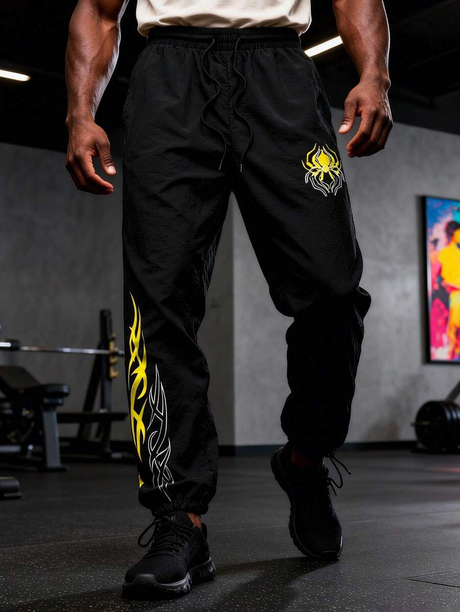 GymBeat Men's Spider Print Woven Jogger Pants - Black - View 1