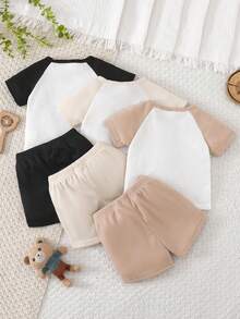 SHEIN Vintaside Kids 6 piezas de conjuntos casuales para bebés y niños pequeños, incluyendo camisetas de manga corta de cuello redondo con mangas raglán en azul marino, verde claro, naranja claro y blanco, y pantalones cortos deportivos, adecuados para el verano - Multicolor - Ver 2