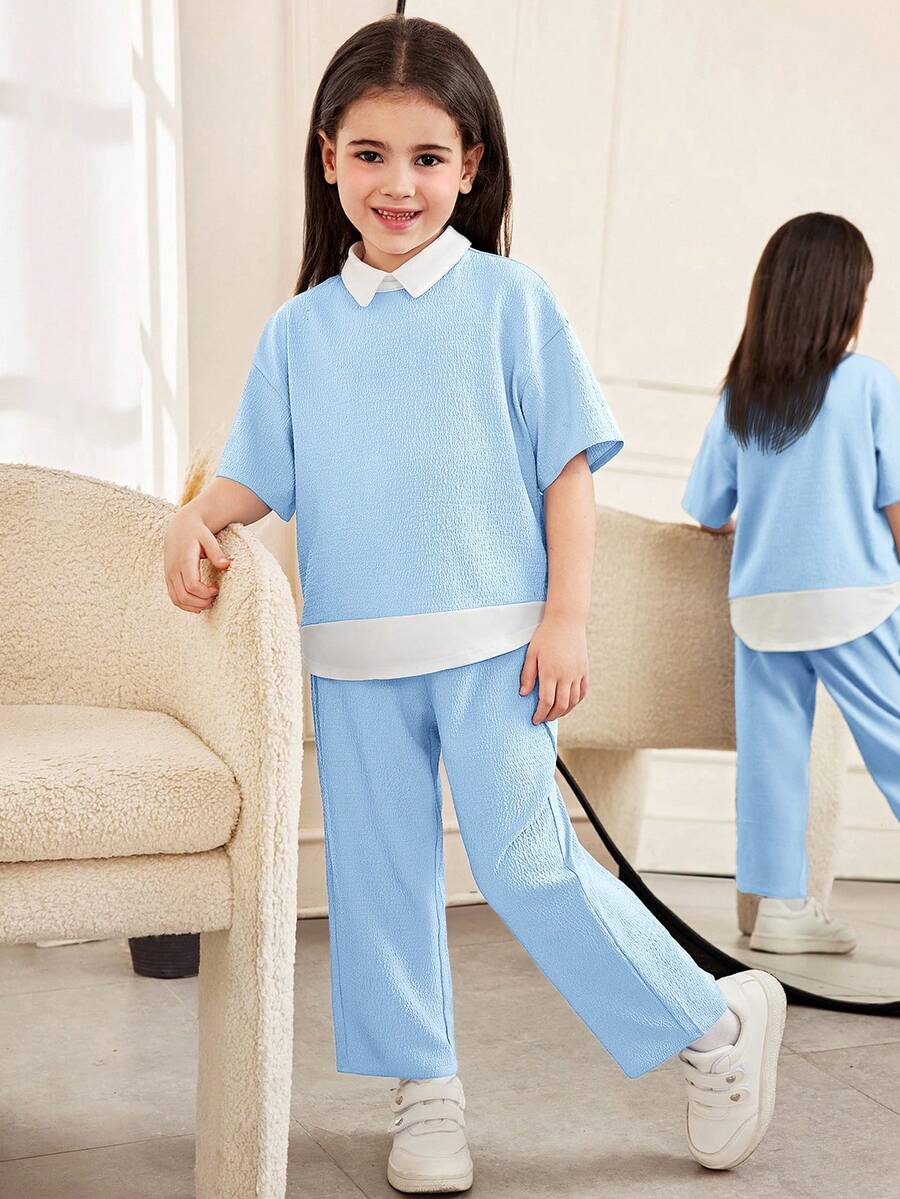 SHEIN Bộ đồ thể thao nữ trẻ trung, thanh lịch, gồm áo sơ mi cổ bẻ dáng rộng, vai rớt, tay ngắn, chất liệu dệt họa tiết phối màu, kết hợp với quần ống đứng. - Màu xanh nhạt - Xem 1