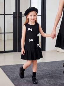 Neues Sommerkleid für Kleinkindmädchen mit ärmellos, gerüschtem Saum und Schleifenakzent, weiß - Schwarz - Übersicht 10