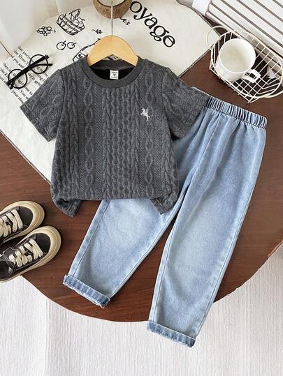 SHEIN 2pcs/Set Young Boy Fashionable Versatile White Textured Knit Fabric Embroidered Decor Round Neck Short Sleeve Top Paired With Elastic Waist Washed Denim Long Pants Set, Suitable For Outdoor, Vacation, Shopping, Party, Photo Shoot And Other Occasions