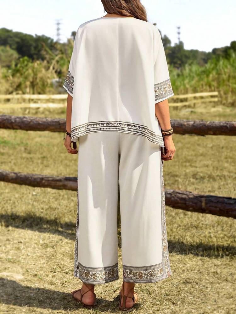 2pc Set Plus Size Women's Summer Casual Vacation Country  Floral Print All Print Crew Neck Elbow Sleeve Short Sleeve Loose Blouse Top Shirt And Wide Leg Pants Casual 2 Pieces Set With Pockets,Spring/Summer,Summer\Vacation,Summer Holiday,Spring Break Outfits ,Vacation Outfits Women ,Holiday Outfits For Women,Going Out Outfits,2026 New Clothes,Simple And Fashionable For Everyday Wear,Suitable For Summer, Vacation, Daily Wear,Suitable For Summer, Vacation, Daily Wear,Country Concert Outfit ,Modest Two Piece Set, Plus Size Summer Sets,Plus Size Pants Set,Boho Set,Boho Pants Set For Women,Wide Leg Pants Set,2 Piece Casual Sets Woman,Two Piece Set Women Comfy,Capri Sets For Women