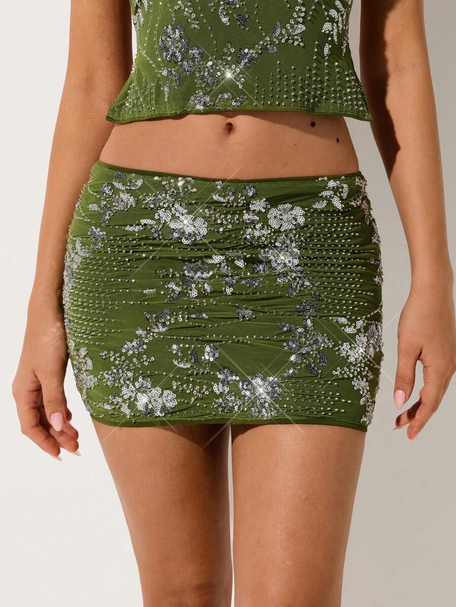 SHEIN ICON Chân váy ngắn ôm sát eo thấp lấp lánh gợi cảm, màu xanh lá cây, thích hợp cho tiệc tùng, kỳ nghỉ, đi biển. - màu xanh lá - Xem 1