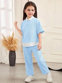 SHEIN Bộ đồ thể thao nữ trẻ trung, thanh lịch, gồm áo sơ mi cổ bẻ dáng rộng, vai rớt, tay ngắn, chất liệu dệt họa tiết phối màu, kết hợp với quần ống đứng. - Màu xanh nhạt - Xem 6