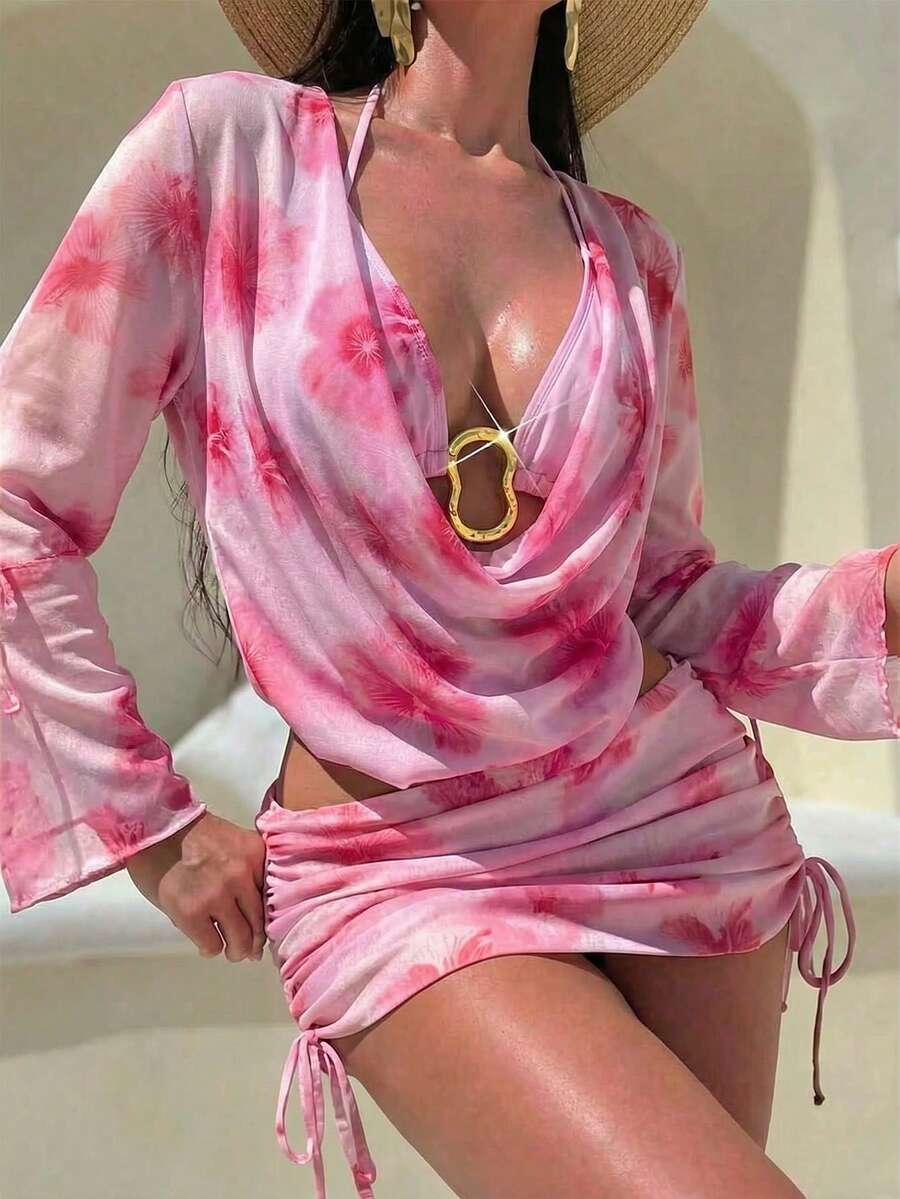 Bellisia 新款女士优雅 Y2K 热带风情浪漫海滩百搭四件套粉色花卉沙滩套装,垂褶高领露背比基尼套装,饰以金色 O 形环,垂褶网纱长袖罩衫,以及褶皱抽绳半身裙——浅粉色底色,点缀着紫红色芙蓉花,轻盈飘逸,尽显女性柔美气质。是夏季海滩度假、泳池派对、音乐节、婚礼、春假出行的完美之选。 - 粉色 - 查看 1