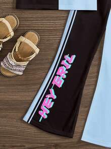 色彩鲜艳的蓝黑撞色，K-Pop 超级巨星款，69，少女休闲卡通图案圆领短袖上衣和喇叭裤两件套，适合夏季穿着 - 彩色 - 查看 6