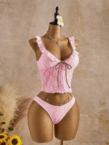 Swim Mod 夏季新款欧美风分体两件套泳衣，露脐上衣饰有撞色滚边和荷叶边，搭配撞色滚边三角比基尼泳裤，支撑性吊带泳衣，适合海滩、泳池派对、生日、度假等场合。 - 藕粉色 - 查看 4