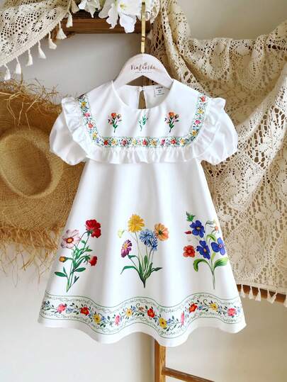 Elladie kids Vestido coreano minimalista de primavera/verano para niñas (talla pequeña), de tela tejida con base blanca y estampado floral digital colorido, cuello redondo, manga corta abullonada, diseño de volante en el bajo, adecuado para uso diario, escolar, salidas y vacaciones, con estilo lindo, elegante y refinado