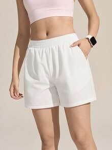Exploreva Quần short nữ màu trơn có túi, kiểu dáng thường ngày, đa năng, thích hợp cho hoạt động ngoài trời. - trắng - Xem 1