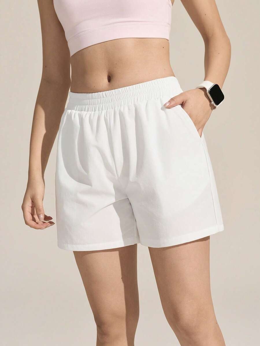 Exploreva Quần short nữ màu trơn có túi, kiểu dáng thường ngày, đa năng, thích hợp cho hoạt động ngoài trời. - trắng - Xem 1