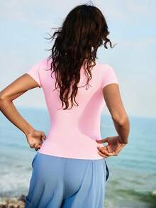 WanderVale Women's Twist Knot V-Neck Short Sleeve Fitted Sports T-Shirt,Pink Summer Athleisure Gym Yoga Top,Cute Cropped Plain Body Shirts,Tight Fitting Tops - Baby Pink - View 2