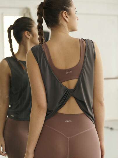 Nöista Lightweight Tank With Open Back And Twist Detail. Ideal For Summer Tops, Spring Outfit Women, Outfits, Gym, Yoga, Layering, And Casual Activewear.
