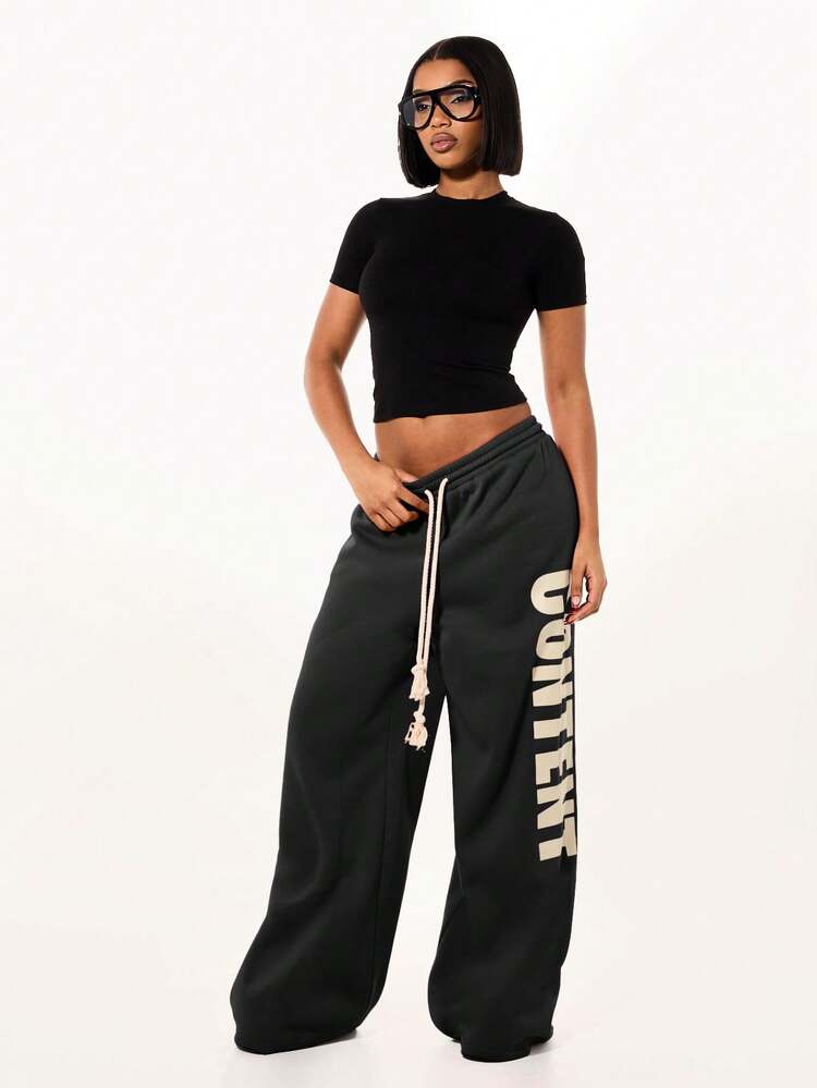 SUMWON WOMEN Oversized Wide Leg Joggers With Drawstring Waist And Side Text Graphics For Casual Streetwear Comfort