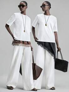 Ontre Đầm nữ 2026SS màu trắng ngà, chất liệu satin crepe, mềm mại, thoải mái, viền ren, dây mảnh, thiết kế xẻ tà bên hông, đa năng, thanh lịch, sang trọng, phù hợp cho du lịch biển, hiện đại, thành thị, công sở, nhưng vẫn mang hơi hướng cổ điển tinh tế, thời trang sân bay cao cấp. - màu nâu - Xem 7