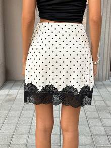 SHEIN PariChic 女士杏色黑色波点中长裙。波点设计，常规腰线，黑色蕾丝饰边。弹性腰带，穿着舒适。可单穿，也可内搭衬裙，或打造性感迷人的造型。是春夏的完美单品，尽显温柔优雅的气质。两件套女裙，夏季半身裙套装，黑白半身裙，度假装扮，蕾丝两件套，蕾丝半身裙，短裙，波点半身裙，女士半身裙。 - 杏色 - 查看 2