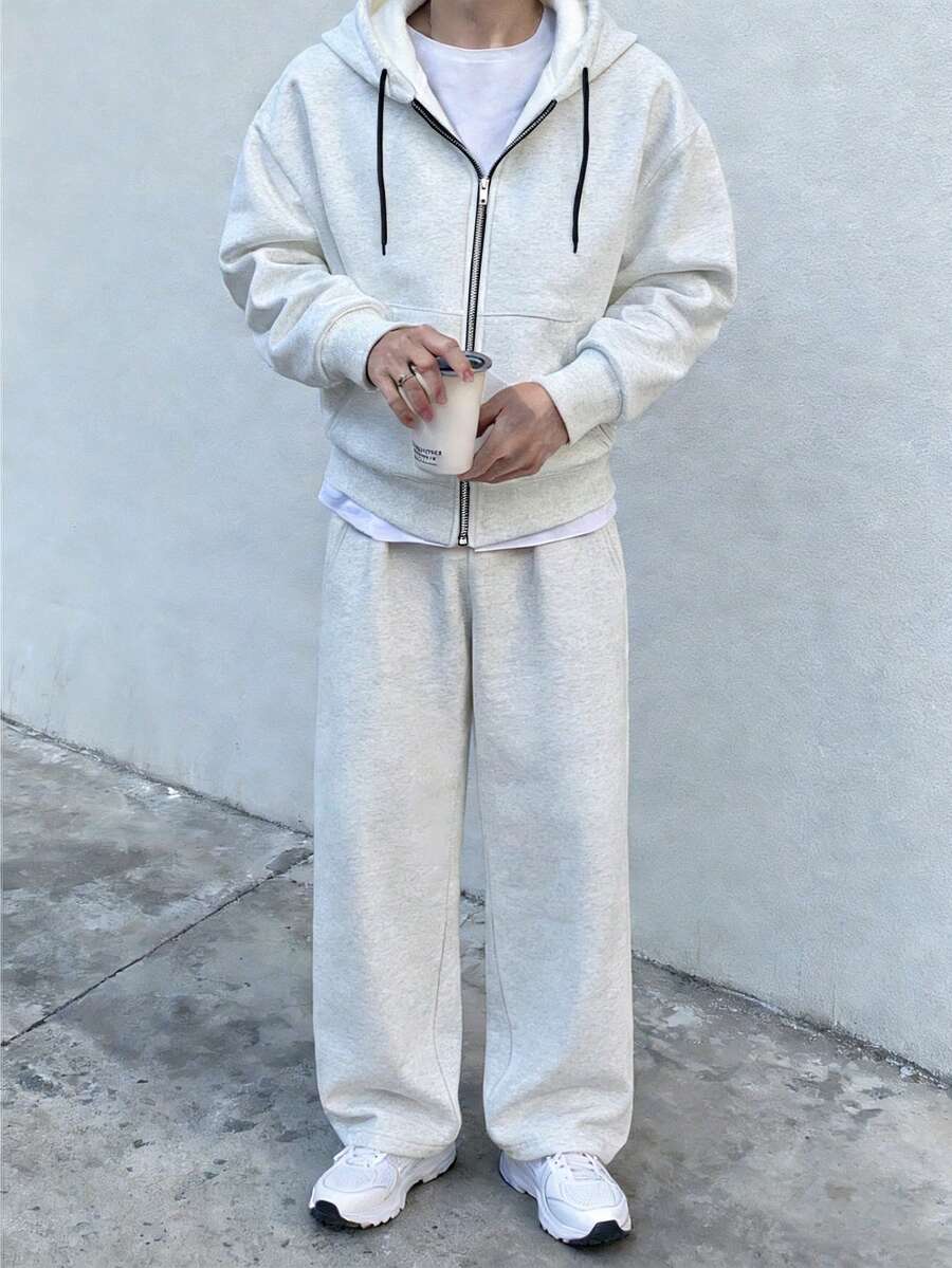 Manfinity Roghcode Bộ đồ thể thao nam thường ngày, áo hoodie có khóa kéo và quần nỉ màu trơn, phong cách đường phố, rộng rãi, họa tiết, đồ đôi, dành cho bạn bè, thể hiện tình yêu với bạn trai, phong cách đường phố, dành cho các cặp đôi. - Xám - Xem 1