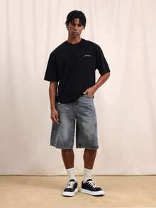 SUMWON T-shirt oversize col rond pour hommes avec graphique orné de clous Nevada USA au dos et logo décoratif à l'avant. Coupe décontractée et carrée, manches courtes - Noir - Voir 5