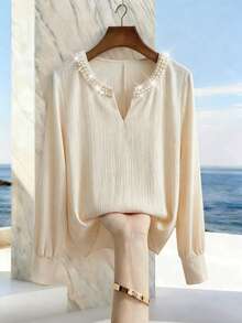 Franclia 女士优雅圆领V领珍珠装饰长袖衬衫，适合通勤和日常优雅穿着 - 杏色 - 查看 1