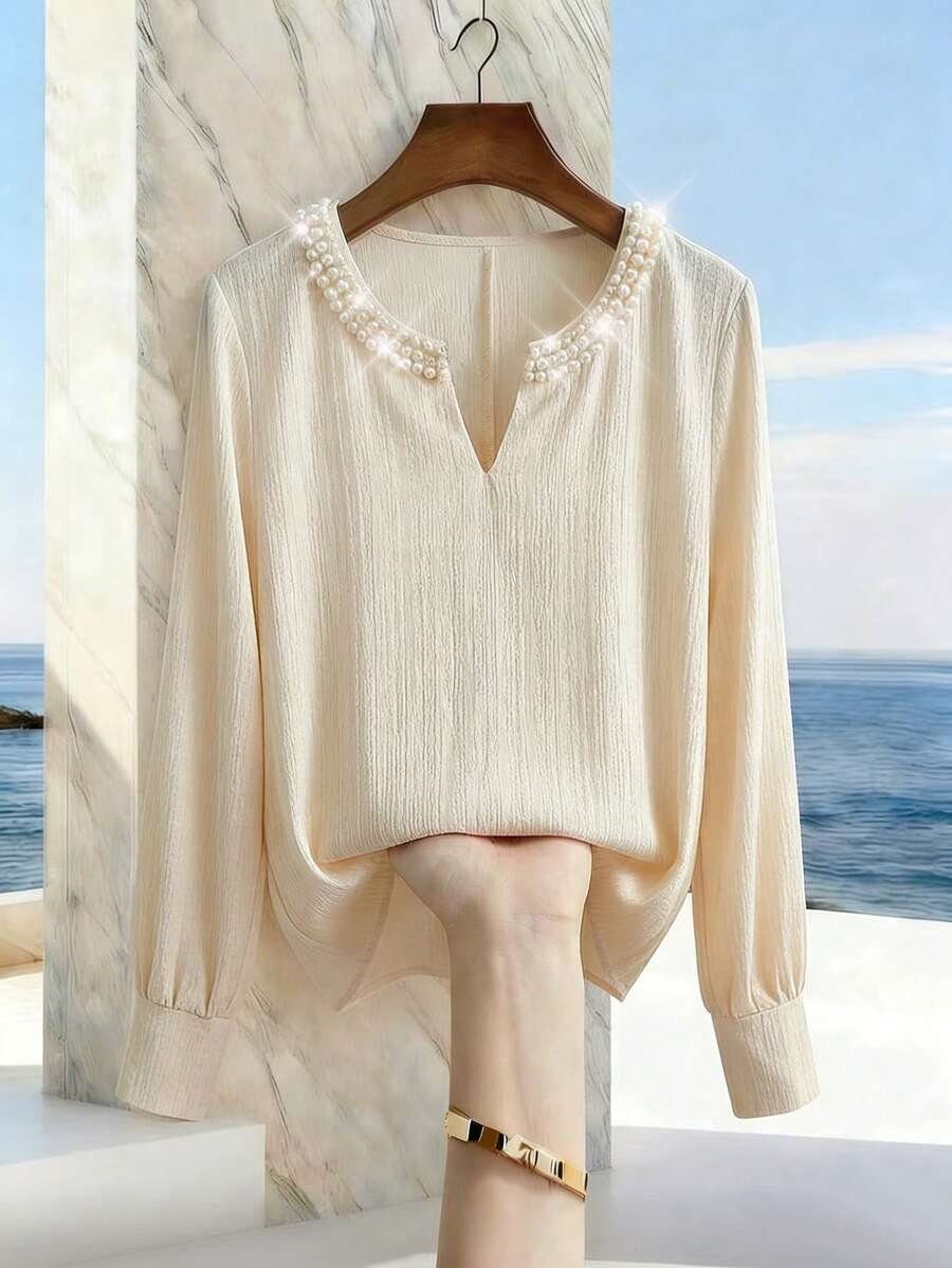 Franclia 女士优雅圆领V领珍珠装饰长袖衬衫，适合通勤和日常优雅穿着 - 杏色 - 查看 1