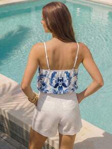 CAJUNI Ärmellose Bodysuit mit Arabesque Blumen Muster - Blau-Weiß - Übersicht 2