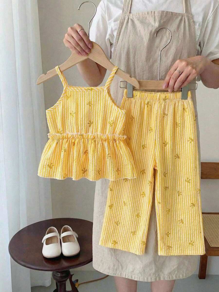 SHEIN Vintaside Kids 2pcs/Set Young Girls Cute Striped Bow Print Camisole Top With Ruffle Hem & Wide Leg Pants, Sweet & Fresh, Summer Little Girl Co Ord Set Little Girl Two Piece Set Toddler Co Ord Yellow Two Piece Set For Girls - Yellow - View 1