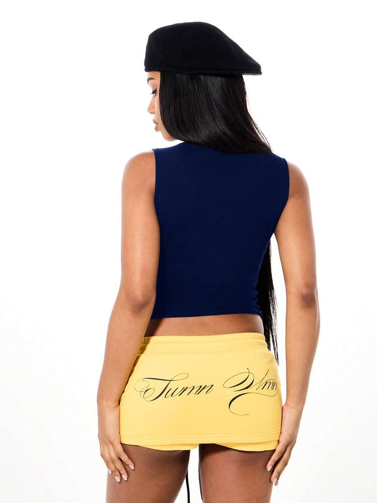 SUMWON Top corto estivo casual con scollo a V profondo, senza maniche, di colore blu navy, con stampa in giallo intenso