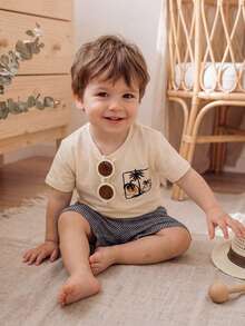 SHEIN Bộ 2 món cho bé trai/bé gái: Áo thun ngắn tay in hình hoạt hình dễ thương và quần short cạp chun kẻ sọc, trang phục thường ngày cho kỳ nghỉ hè. - Nhiều màu - Xem 6