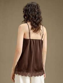 Ontre Đầm nữ 2026SS màu trắng ngà, chất liệu satin crepe, mềm mại, thoải mái, viền ren, dây mảnh, thiết kế xẻ tà bên hông, đa năng, thanh lịch, sang trọng, phù hợp cho du lịch biển, hiện đại, thành thị, công sở, nhưng vẫn mang hơi hướng cổ điển tinh tế, thời trang sân bay cao cấp. - màu nâu - Xem 2