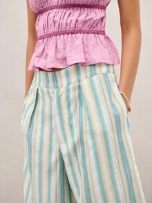 Nöista 条纹阔腿裤，正面有两个褶裥，配有隐形纽扣和拉链。适合休闲日常、旅行、晴天、度假、夜间外出、音乐节、夏日派对、约会之夜或度假夜晚，也是日常穿搭、度假、春季、音乐节、海滩日的理想之选。 - 綠色 - 查看 5