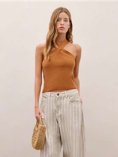 Nöista 罗纹针织吊带背心，交叉前领露背设计。适合夜晚外出。也适合夏季派对、日常穿着、度假、正式场合、春季、音乐节、海滩休闲等场合。