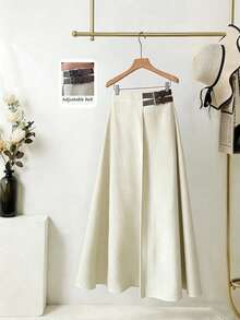 Elenzga 女士A字半身裙，采用柔软舒适的杏色面料，竹纤维针织设计，优雅知性，A字廓形修身显瘦，凸显腿部线条，配有小腰带增添设计感，适合工作、旅行和社交场合，是女士衣橱必备单品。 - 杏色 - 查看 1