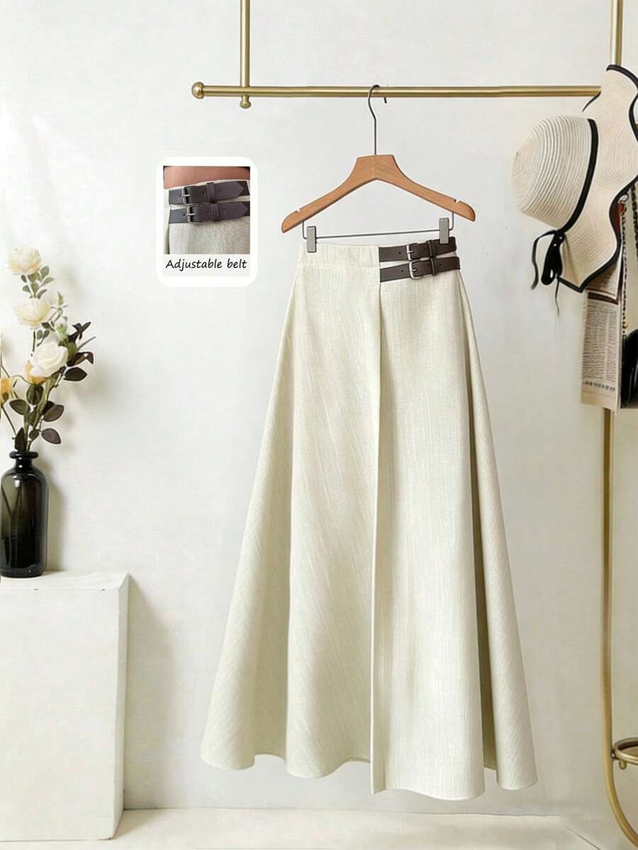 Elenzga 女士A字半身裙，采用柔软舒适的杏色面料，竹纤维针织设计，优雅知性，A字廓形修身显瘦，凸显腿部线条，配有小腰带增添设计感，适合工作、旅行和社交场合，是女士衣橱必备单品。 - 杏色 - 查看 1