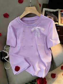 SHEIN Franclia 女士粉色蝴蝶结珍珠装饰甜美Y2K短袖T恤，适合约会、日常、通勤，百搭时尚休闲。淡紫色上衣，淡紫色女式上衣，粉彩色系服装，薰衣草色上衣，浅紫色上衣，串珠上衣，女士上衣和衬衫，串珠衬衫，女士服装，可爱上衣，少女风上衣，定制上衣，漂亮上衣，可爱服装。 - 淡紫色 - 查看 3