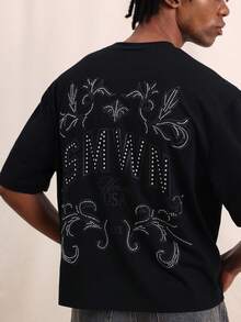 SUMWON T-shirt oversize col rond pour hommes avec graphique orné de clous Nevada USA au dos et logo décoratif à l'avant. Coupe décontractée et carrée, manches courtes - Noir - Voir 6