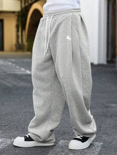 Manfinity EMRG Pantalones de chándal sueltos de unicolor con cordón en la cintura y bolsillos, pantalones de chándal grises holgados, para volver al colegio