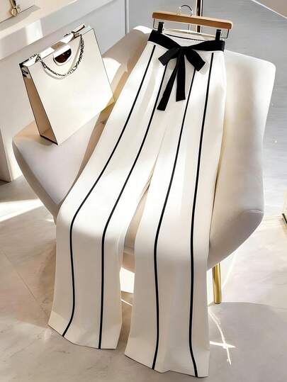 Franclia Spodnie damskie w kontrastowym kolorze, czarno-białe, kontrastowy pas z materiału, elastyczna talia, kieszenie boczne, lamówka w kontrastowym kolorze