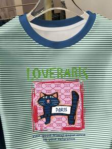 Resyla Áo thun cổ bẻ họa tiết mèo sọc tương phản phong cách Y2K "Paris Cat" in sọc, áo thun casual kiểu preppy, áo thun mùa hè họa tiết mèo sọc tương phản, áo thun casual in hình mèo dễ thương, áo thun tay ngắn họa tiết mèo "Loveraris" sọc tương phản kiểu retro. - màu xanh lá - Xem 4