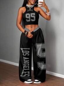 Slaydiva Bộ đồ nữ 2 món phong cách đường phố thường ngày: áo hai dây ôm sát và quần ống rộng, thích hợp cho mặc dạo phố. - màu đen - Xem 4