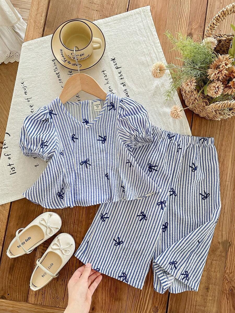 SHEIN LMoss Kids Set de 2 piezas de camisa casual con cuello en V y mangas abullonadas con lazo, y pantalones a rayas para niña - Azul - Ver 1