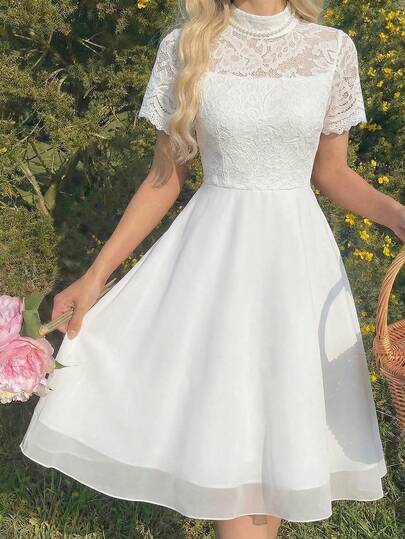 女童蕾丝短袖网纱连衣裙，圆领蕾丝镂空上衣，A字纯色网纱裙，优雅百搭，适合春夏穿着，适合派对、婚礼、聚会等场合。