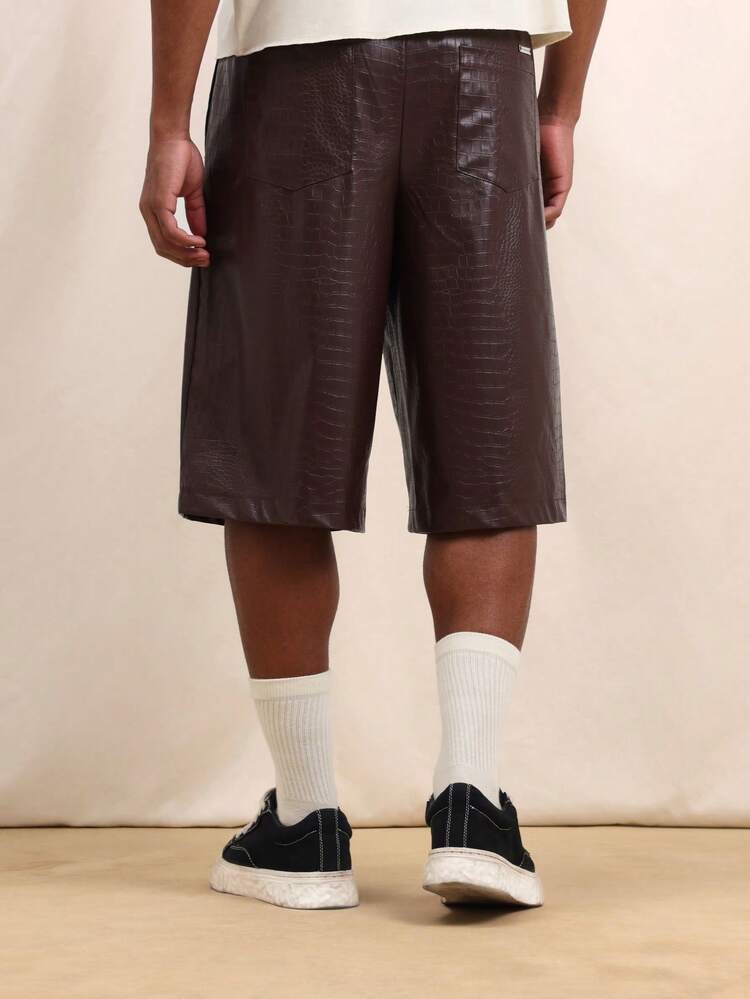 Jorts à jambes larges mi-longueur en faux cuir à imprimé crocodile avec poches latérales pour hommes