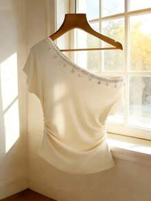 Franclia Women's Cream White Elegant Summer Tea Party One-Shoulder T-Shirt,Lace Trim Star & Shell Decor Ruched Waist One Sleeve Blouse Relaxed Vacation Tops - White - View 1
