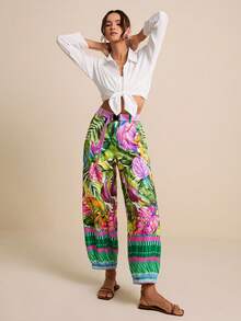 LOTSLUV Women's Floral Tropical Palm Leaf Print Harem Pants With Magenta Belt, Summer Boho Beach Vacation Holiday Tropical, Whimsical Trousers - Green - View 1