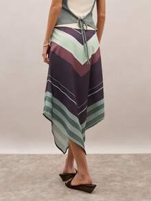 Nöista 这款中长半身裙采用绿色和棕色调的V字印花，中腰设计，侧边配有隐形拉链。轻松百搭，是春夏的理想之选，也是假日、节日或度假穿搭的完美选择。 - 咖啡棕 - 查看 2