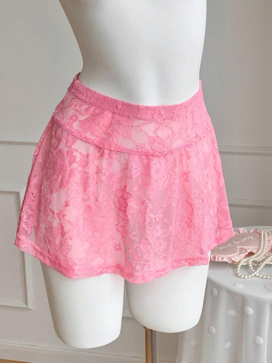 Comfortcana Chân váy ngắn ren hồng dành cho nữ: Chân váy dệt kim xuyên thấu kiểu dáng thường ngày với chi tiết bèo nhún ở gấu váy. - Hồng - Xem 1